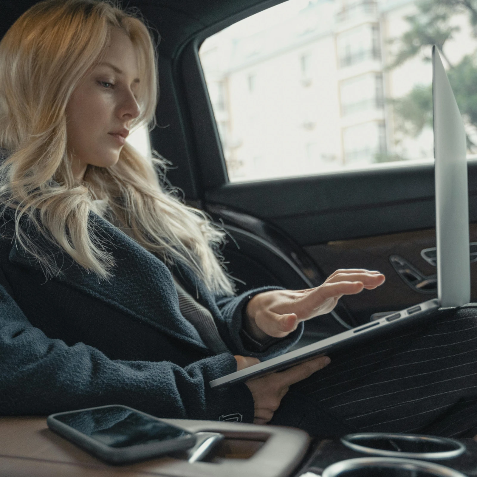 Chauffeur service Milton Keynes business traveller in electric car