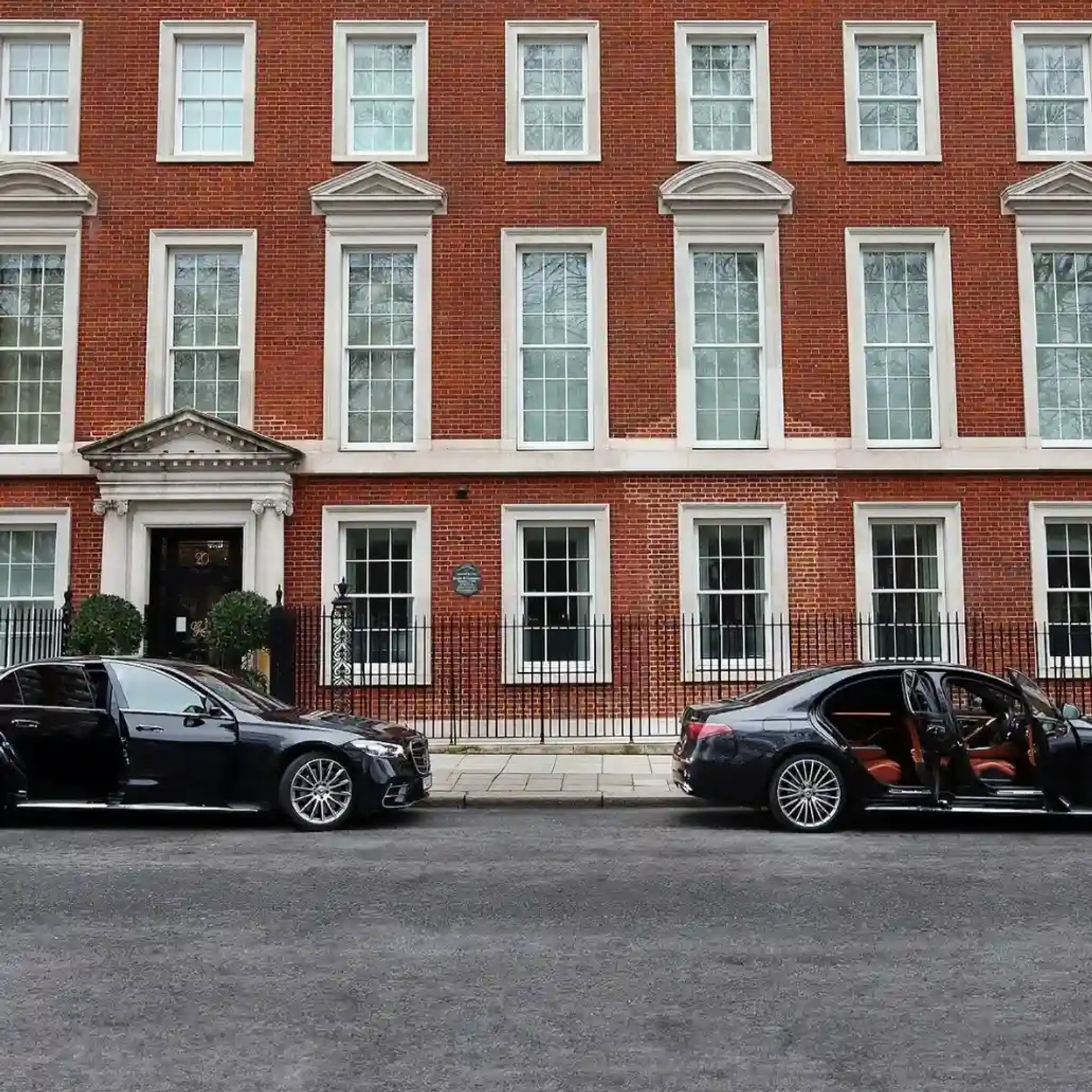 Electric chauffeur car charging port used by Lux Chauffeur's electric fleet